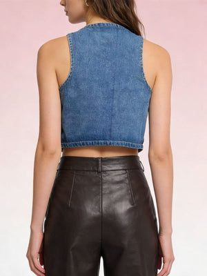 Light blue denim cropped button-down vest with a raw hem.
