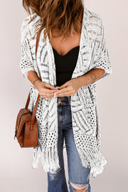 White open knit chevron fringe cardigan with short sleeves and boho styling.