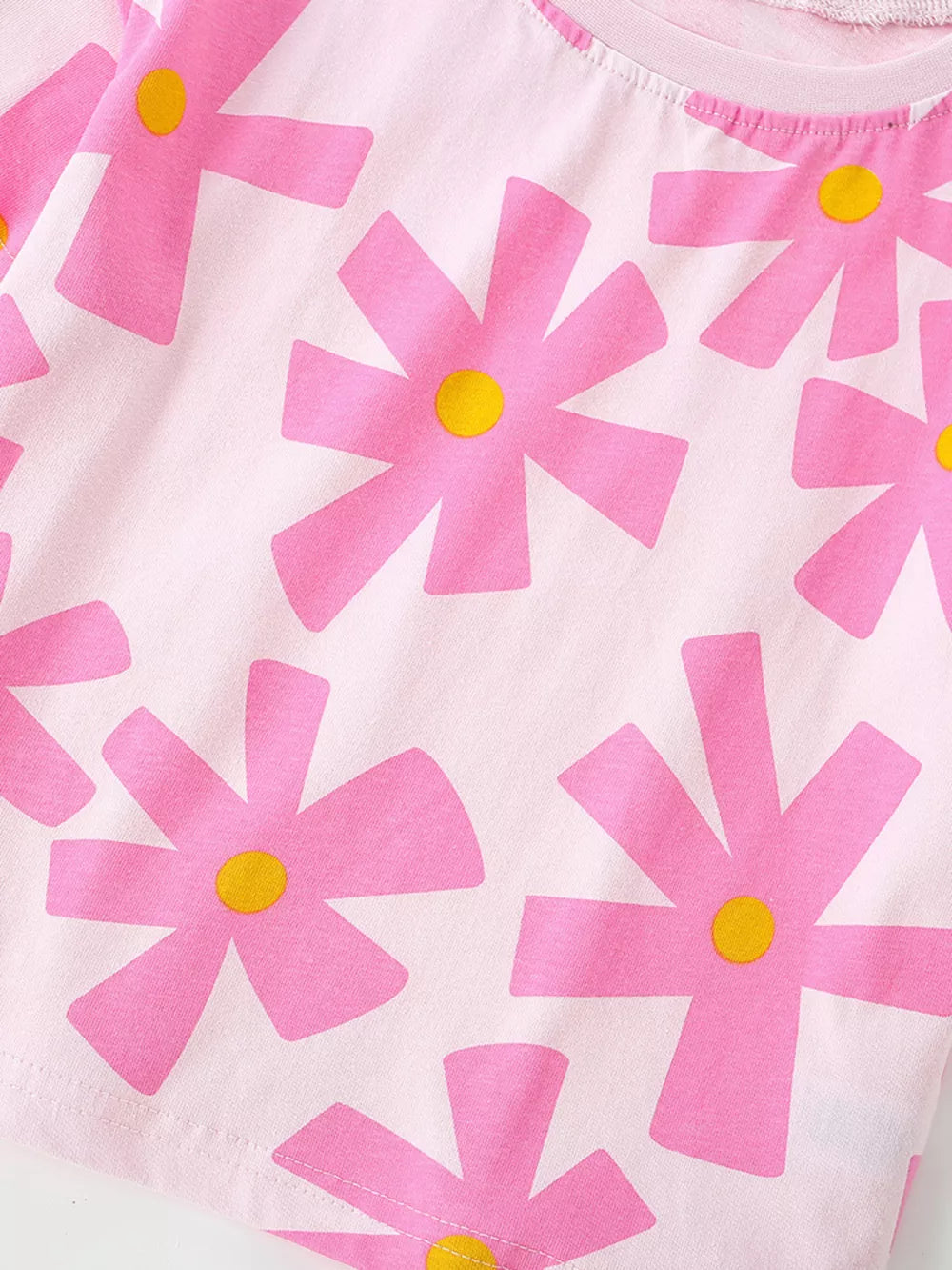 Pink cotton t-shirt for baby girls with a whimsical pink flower print and yellow centers.