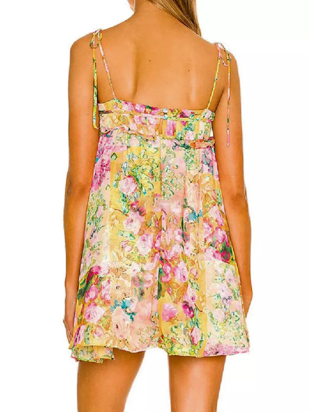Ruffled floral mini dress with tie straps and a yellow floral print.
