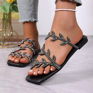 Black rhinestone leaf embellished open toe flat sandals