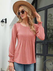 Burnt Coral pleated bodice blouse with gathered sleeves and smocked cuffs.