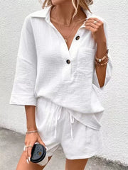 White cotton two-piece set with button-up shirt and drawstring shorts