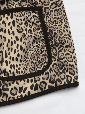 Leopard print boxy jacket with black edge trim and pocket detail.
