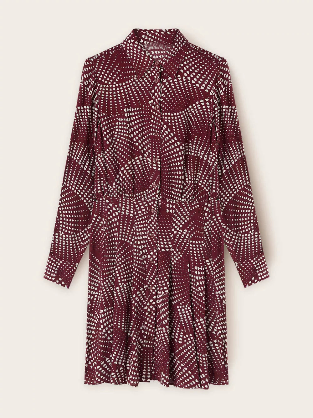 Burgundy mini shirt dress with white heart dot print, button front, long sleeves, and A-line skirt.