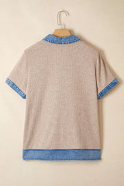 Ribbed knit tunic top in beige with a denim collar, short sleeves, and hem detail.
