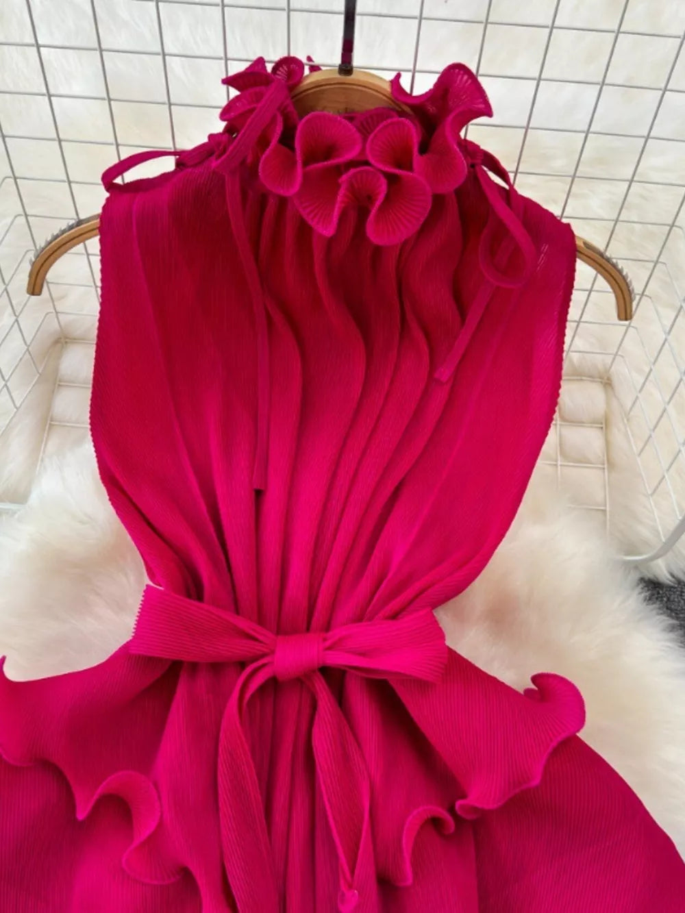 Rose red ruffled tiered midi dress with a belted waist and frill neckline.