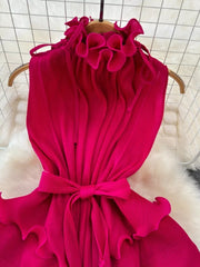 Rose red ruffled tiered midi dress with a belted waist and frill neckline.