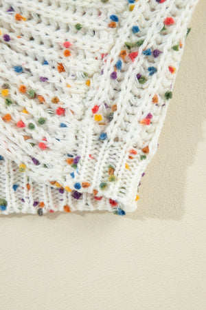 White confetti knit sweater with cable knit detail and open back detail