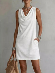 White sleeveless cowl neck mini dress with pockets, casual above knee length