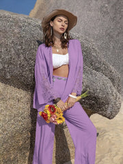 Lavender lace-embellished open front set with wide leg pants and a white bralette.