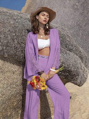 Lavender lace-embellished open front set with wide leg pants and a white bralette.