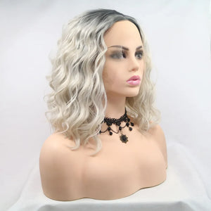 Ombre wave bob wig in black and white with loose curls and a lace front.