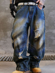 Men's distressed wide-leg jeans in blue cotton with ripped details and a baggy fit.