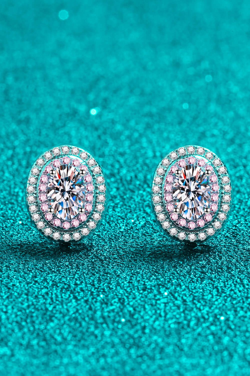 Halo moissanite stud earrings with pink accents and white diamond halo