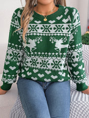 Green acrylic sweater with white reindeer and snowflake jacquard pattern.