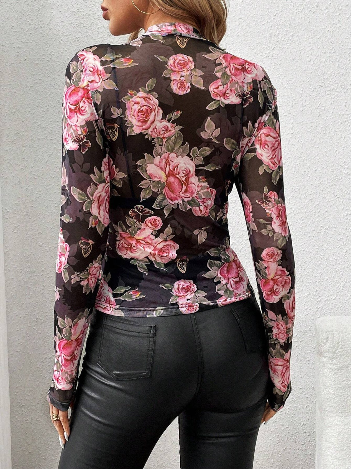 Black mesh bodysuit with pink roses and butterflies, long sleeves, high neck