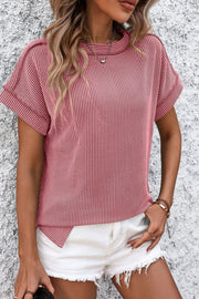 Deep Rose vertical ribbed tunic tee with split hem and short sleeves.