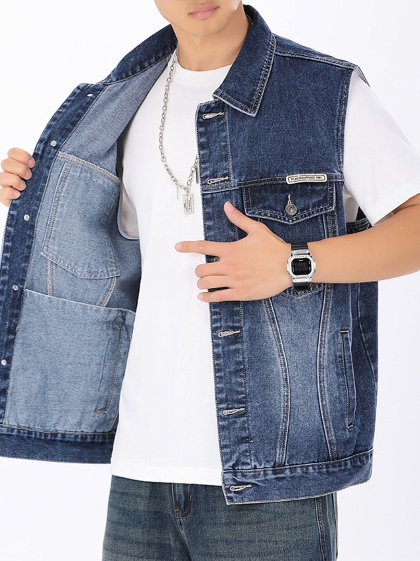 Men's vintage washed denim vest with button-down front and chest pockets.