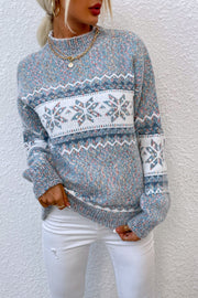 Nordic Fair Isle mock neck sweater in Cloudy Blue acrylic with snowflake pattern, long sleeves.