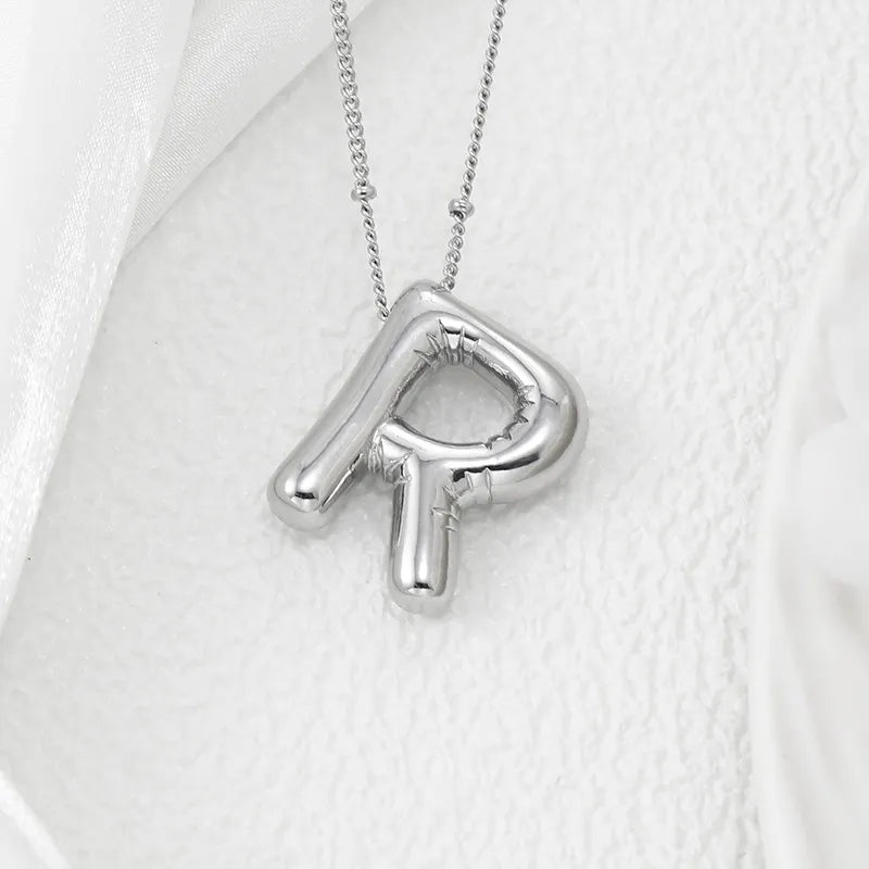 Silver letter R pendant necklace with beaded chain