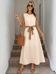 Cream A-line midi dress with pearl neckline and brown tie waist.
