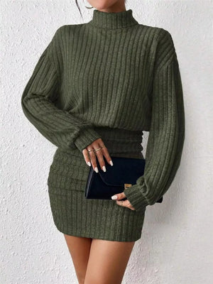 Moss ribbed turtleneck mini dress with long sleeves and a bodycon fit.