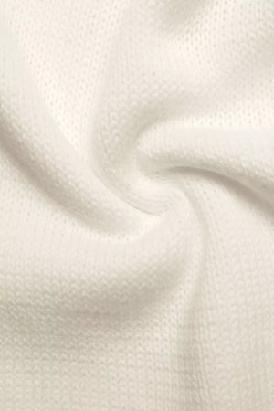 Beige acrylic knit cardigan with V-neck and bow embellishment detail.