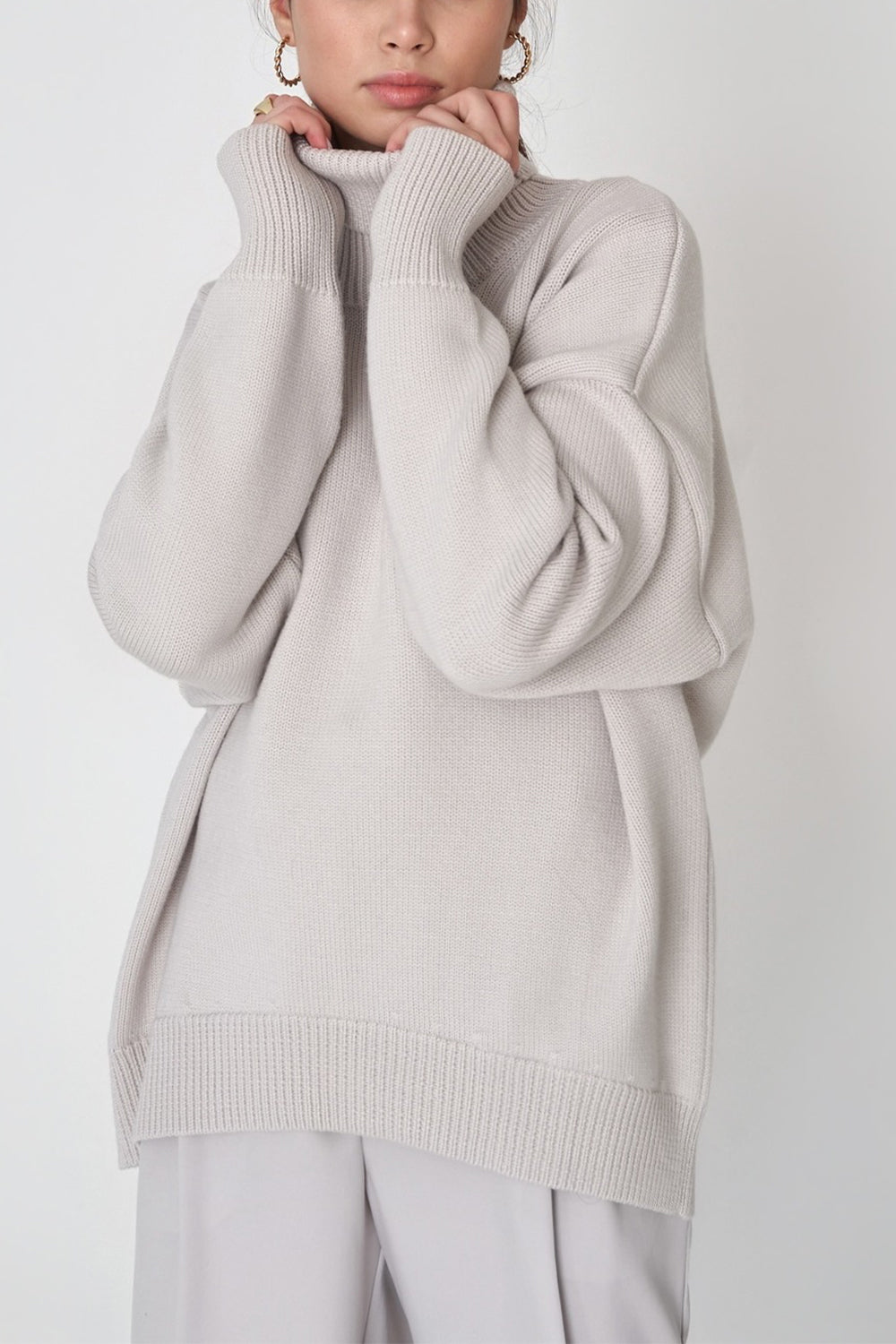 Light Gray Relaxed Roll-Neck Boxy Knit Sweater with ribbed cuffs and hem.