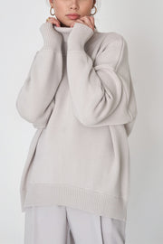 Light Gray Relaxed Roll-Neck Boxy Knit Sweater with ribbed cuffs and hem.