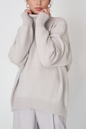 Light Gray Relaxed Roll-Neck Boxy Knit Sweater with ribbed cuffs and hem.