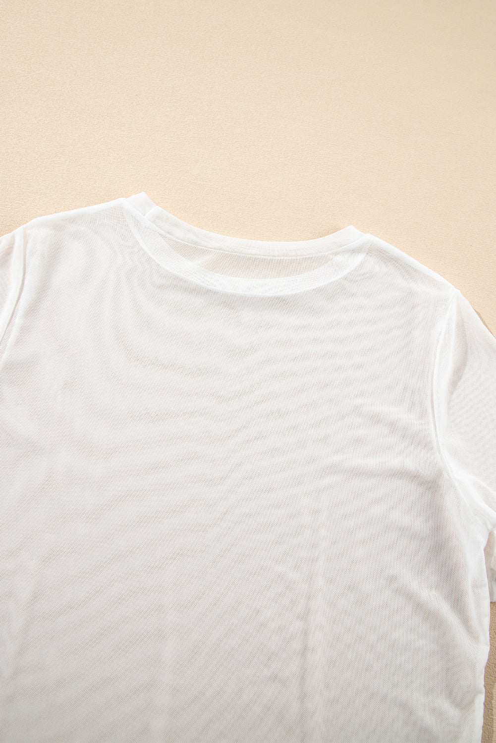 White sheer overlay tee with crew neck and short sleeves