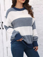 Cozy knit sweater with color block stripes in dark blue and white acrylic.
