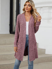 Textured ribbed knit duster cardigan in burgundy with pockets and long sleeves.