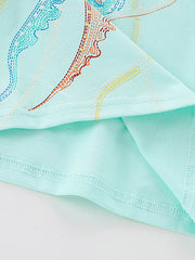 Toddler tee in light blue cotton with colorful embroidered jellyfish graphic detail.