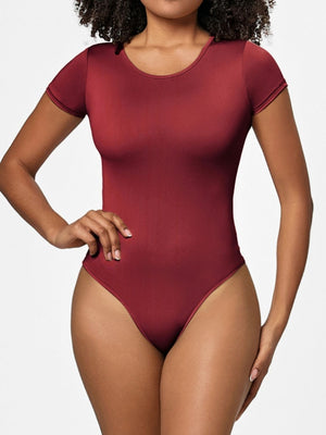 Burgundy short sleeve scoop neck bodysuit with a smooth finish.