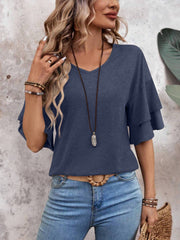 Indigo jersey tee with V-neck and tiered flutter sleeves.