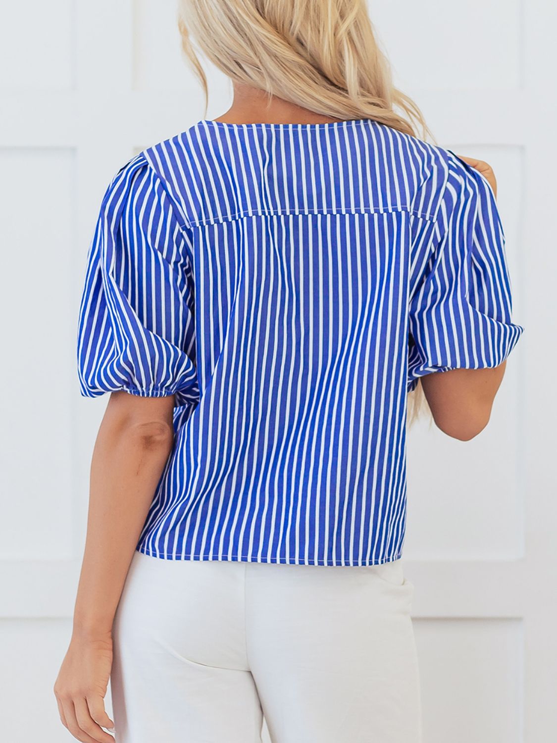 Blue striped puff sleeve blouse with tie-front detail