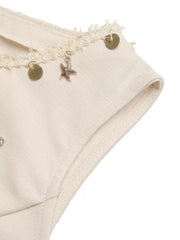 Cream linen maternity set with embellished neckline featuring starfish and sequin charms.