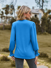 Sky blue blouse with pleated yoke and shirred cuffs