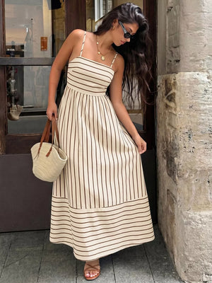 Patterned maxi dress with smocked detail and cutout in apricot.