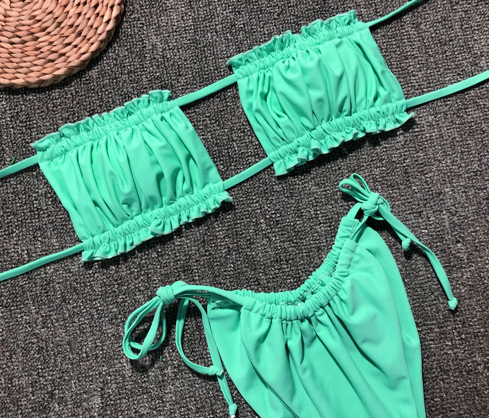 Neon green polka dot ruffle bandeau bikini set with tie details.