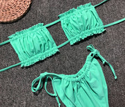 Neon green polka dot ruffle bandeau bikini set with tie details.