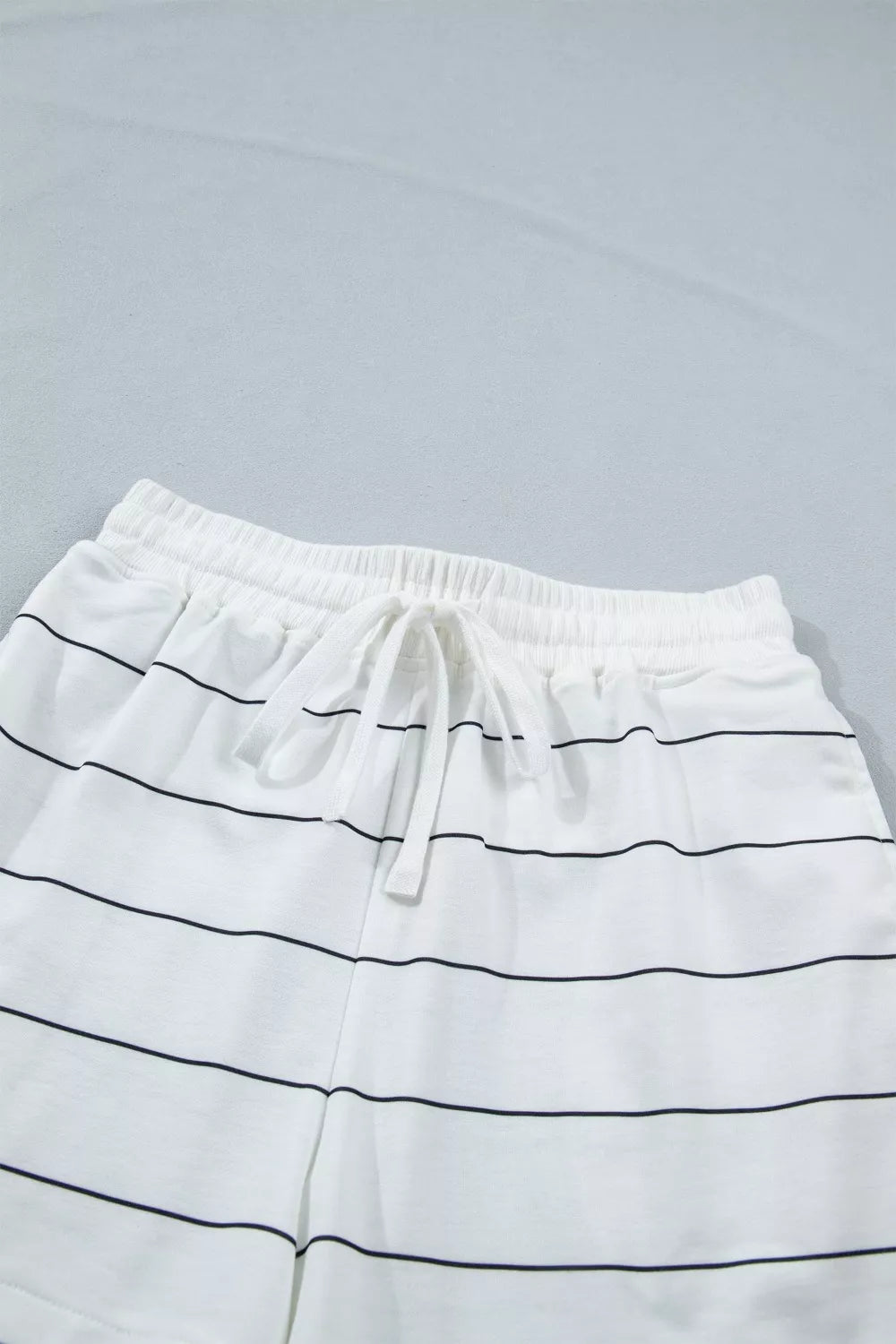 White striped bikini shorts with drawstring waist