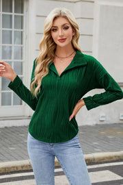 Dark Green pleated wave-effect collared blouse with long sleeves.