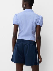 Light blue striped maternity shirt with puff sleeves and gathered waist