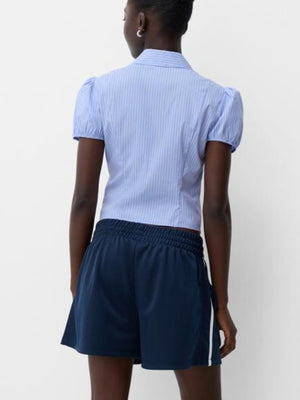 Light blue striped maternity shirt with puff sleeves and gathered waist