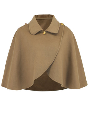 Camel asymmetric button-front cape jacket with a collar and gold button details.