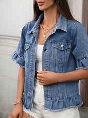 Blue denim trucker jacket with ruffled sleeves and hem, button-up front, and raw edges.