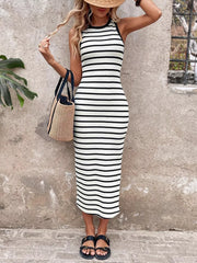 White and black striped bodycon midi dress with a round neckline and sleeveless design.